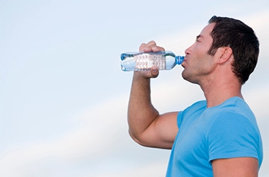 Functional Medicine South Chesterfield VA Man Drinking Water Man Drinking Water